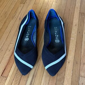Rothy's Black Pointed Flats with white trim